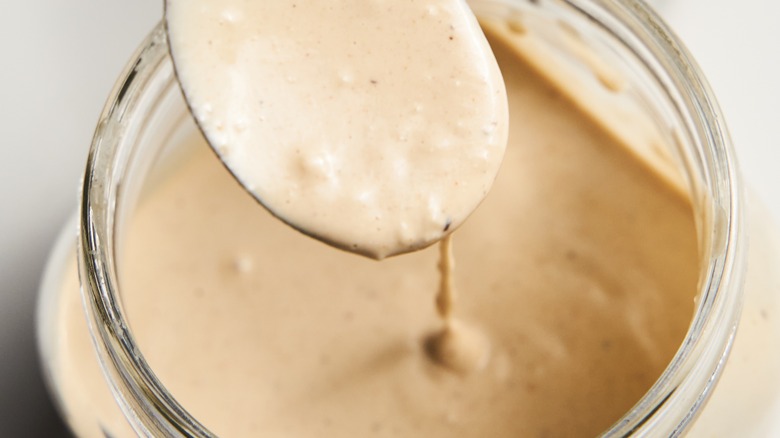 Tahini sauce in jar