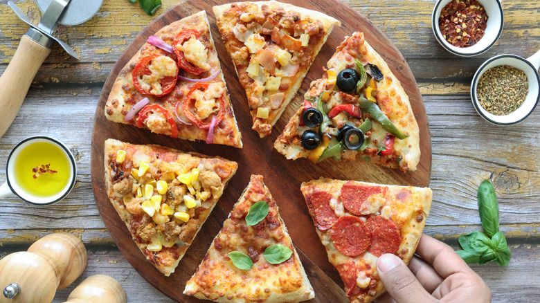 Pizza slices with different toppings