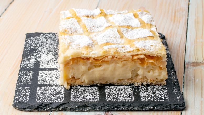 Cremeschnitte with powdered sugar