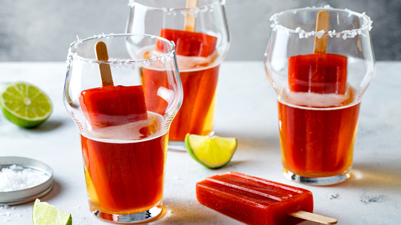 Tomato popsicles in a beer glass