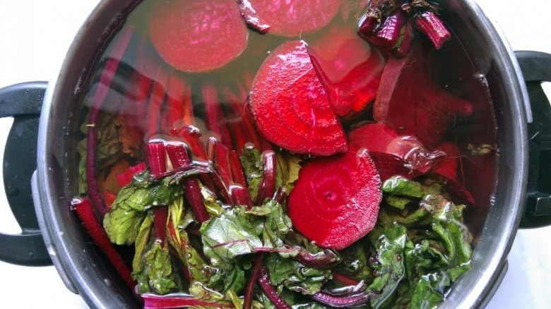 beets in water-filled pot