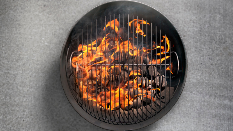 charcoal barbecue with flames