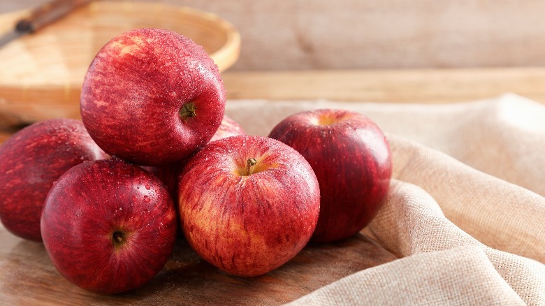 Apples stacked on table