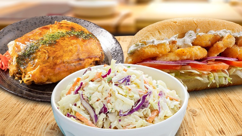 Bowl of coleslaw with meat and sandwich