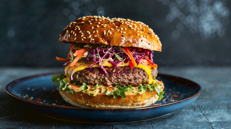 Burger with coleslaw and other toppings