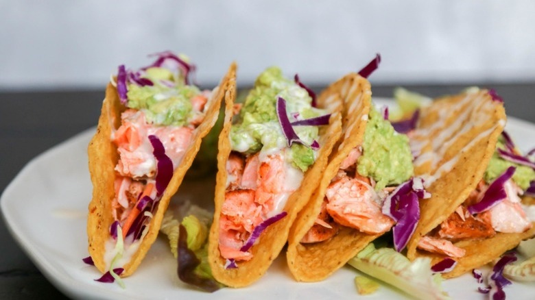 Salmon tacos on plate