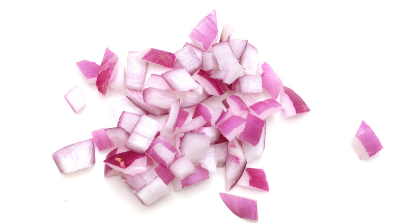 Red onions on white background