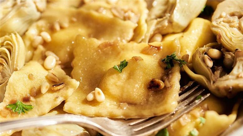 Ravioli squares with fork