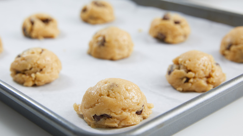 Baking pan with raw cookie dough balls