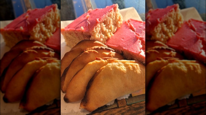 Pink cake and empanadas