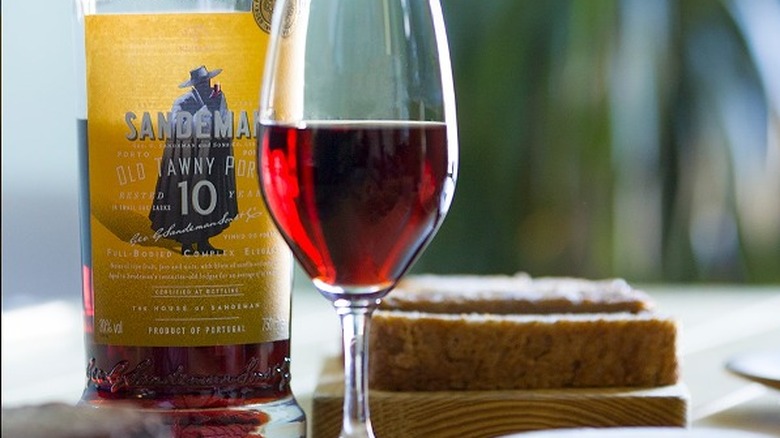 Sandeman tawny bottle and glass