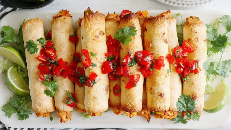 Pile of crispy chicken flautas