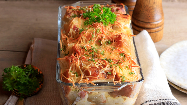 Savory bread pudding in container