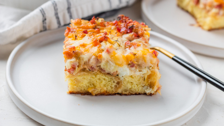 Breakfast casserole slice on plate