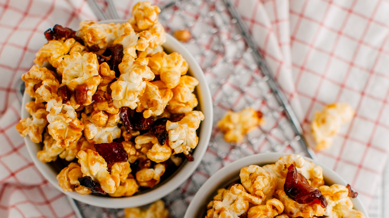 Maple bacon popcorn in white bowls