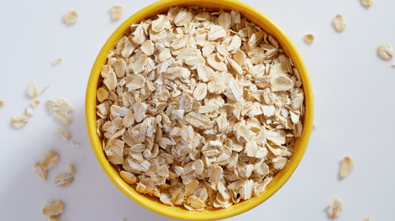 Rolled oats in a yellow bowl