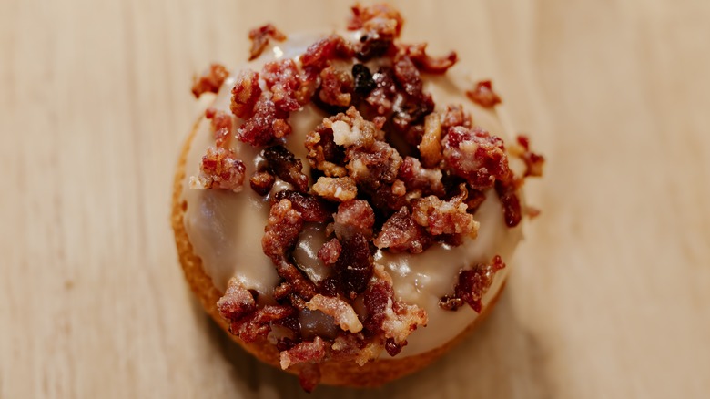 Maple bacon donut on table