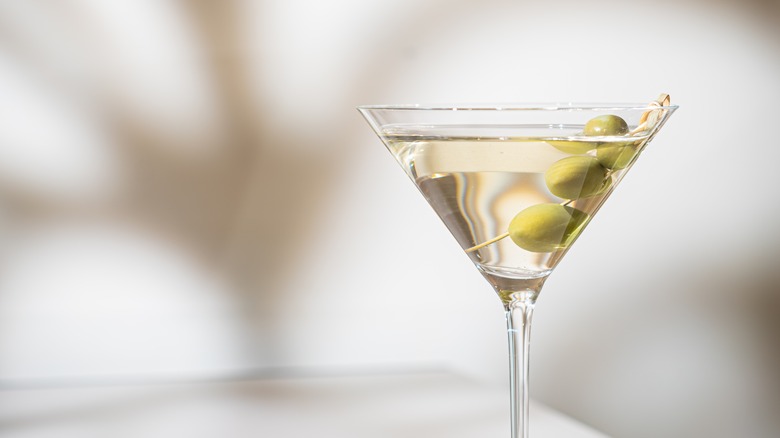 Martini in glass with olives