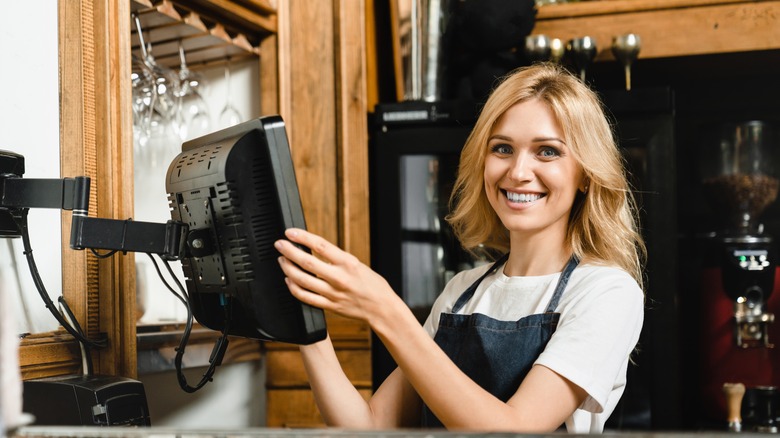 Bartender smiling and closing tab