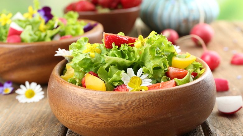 Salad with chamomile flowers