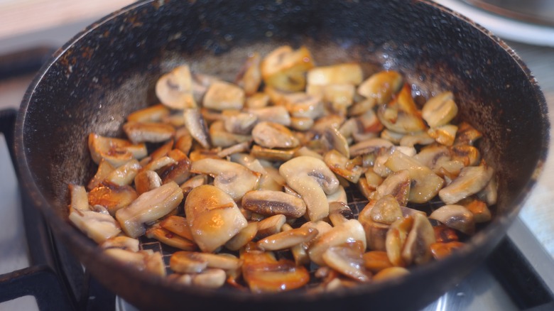 Fried mushrooms in pan