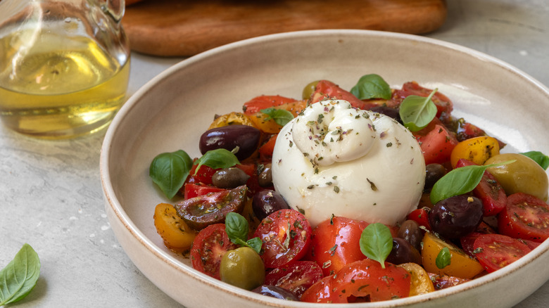 Burrata cheese on salad