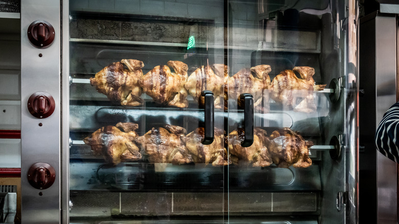 Rotisserie chicken in ovens