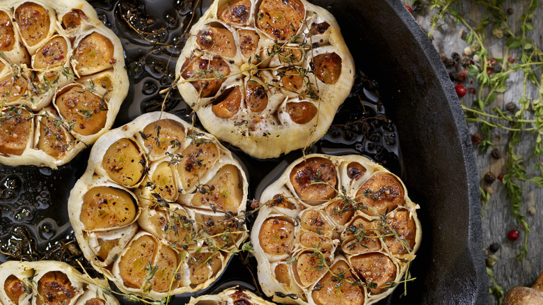 Roasted garlic halves on plate