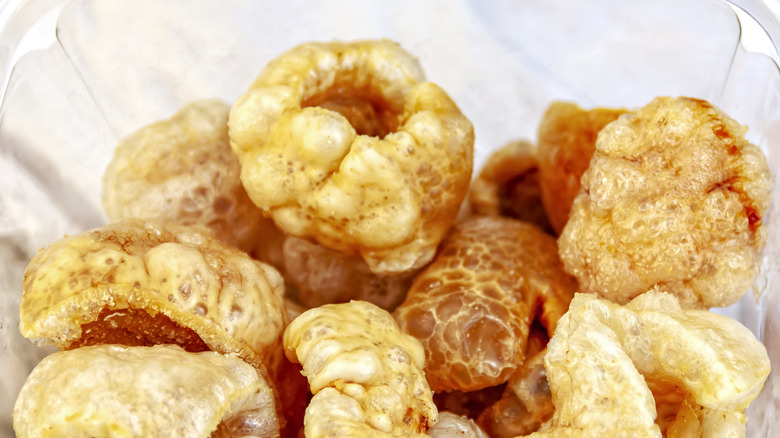 Pork rinds in transparent bowl