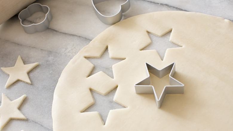 Cookie cutters with dough