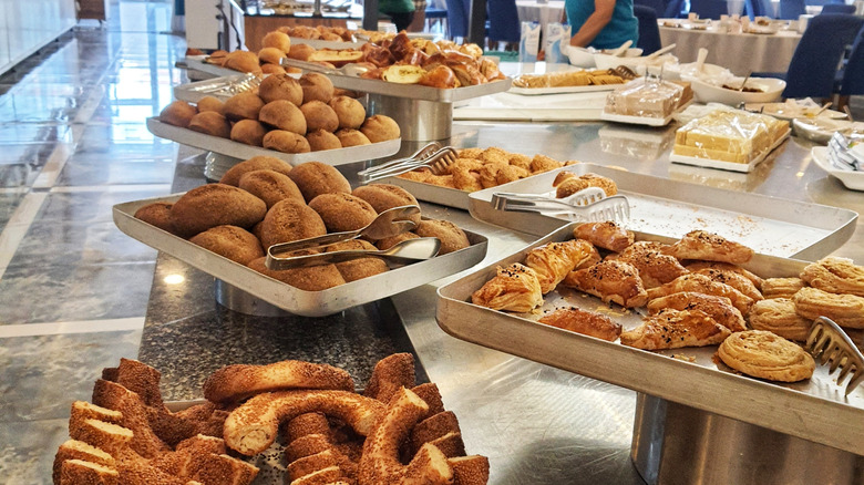 hotel breakfast buffet showcasing an array of breads and pastries