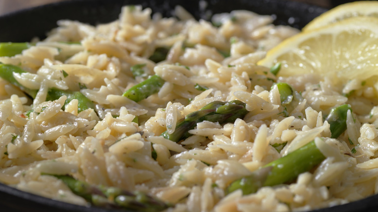Risotto with lemon wedges