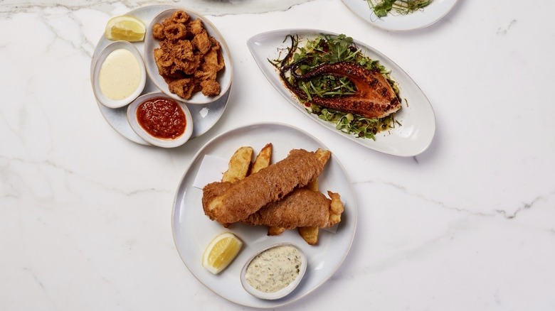 fried seafood on white plates