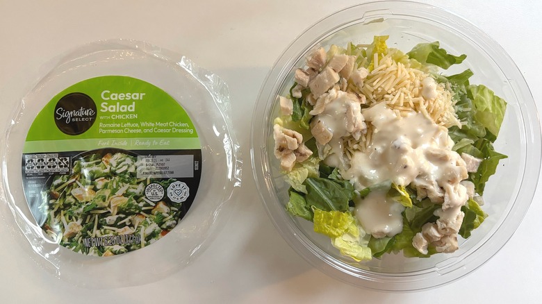Signature Select Caesar Salad with Chicken bowl on white table
