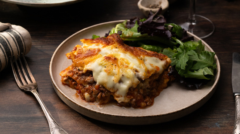 Lasagna slice with salad