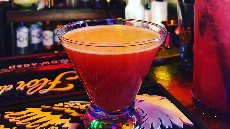 Smooth, red and orange Halekulani cocktail