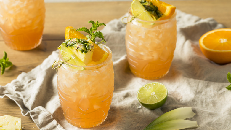 Tiki cocktails with pineapple garnish