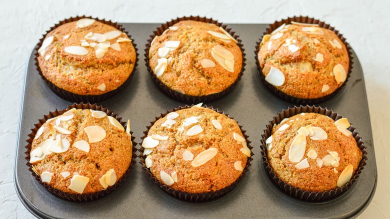 Almond muffins in tin