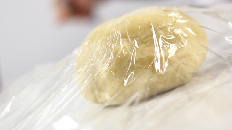 Pie dough wrapped in plastic