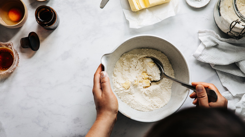 Mixing ingredients for pie dough