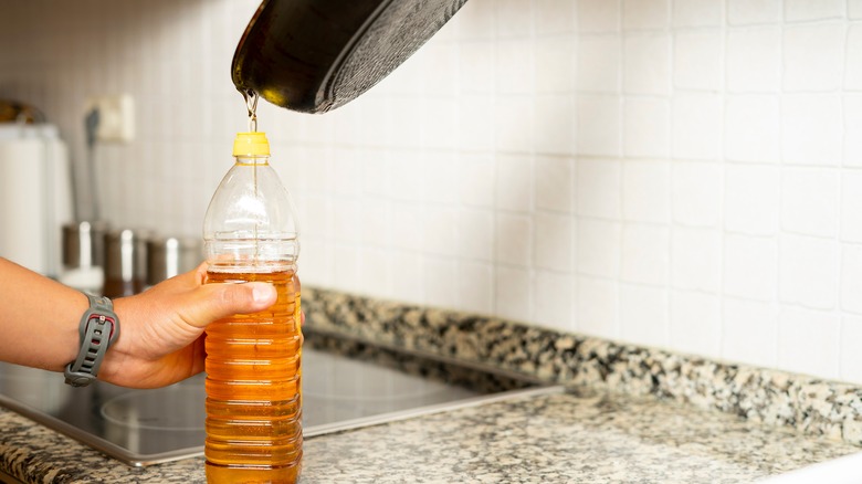 Person recycling frying oil