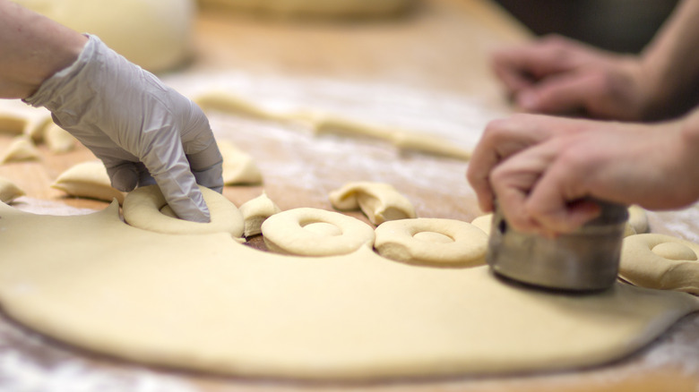 Cutting donuts by hand