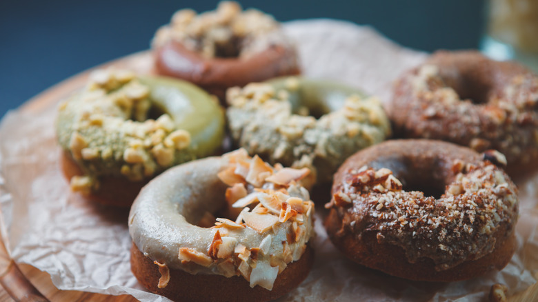 Decorated donuts on table