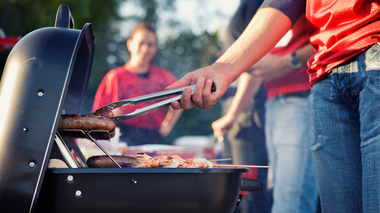 Tailgate grilling with meat