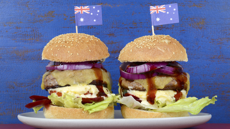 Two burgers with Australian flag on blue background 