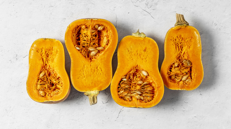 Cut butternut squash on grey background