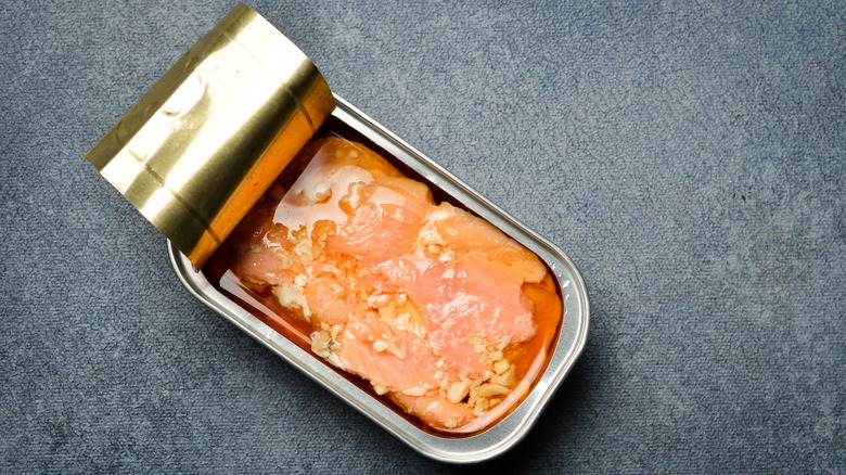 Open tin of salmon from above