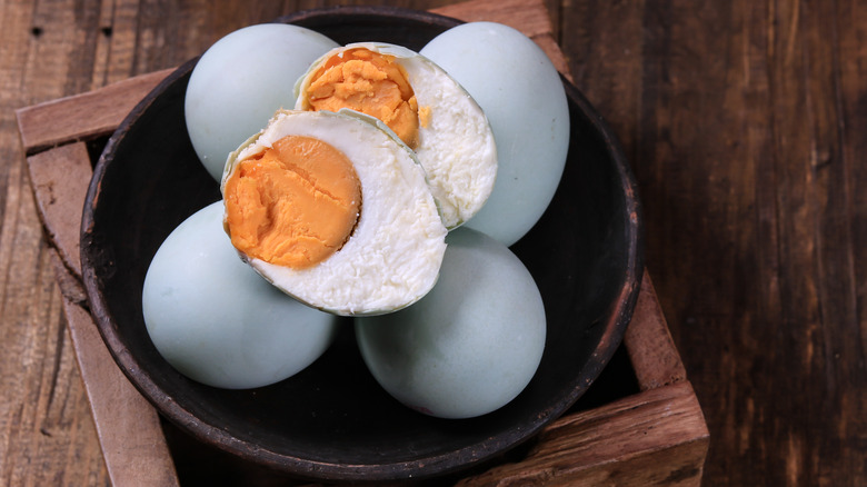 Duck eggs in black bowl 