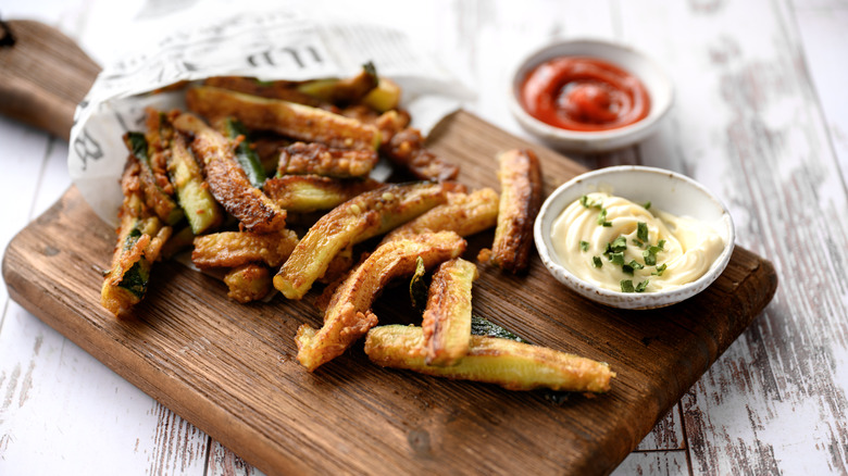 zucchini fries on cutting board