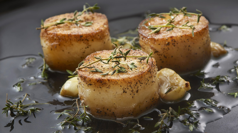 Fondant potatoes in skillet